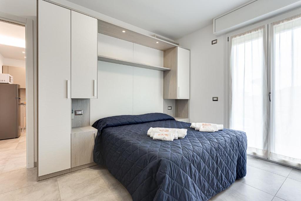 Postel nebo postele na pokoji v ubytování Hotel Riz