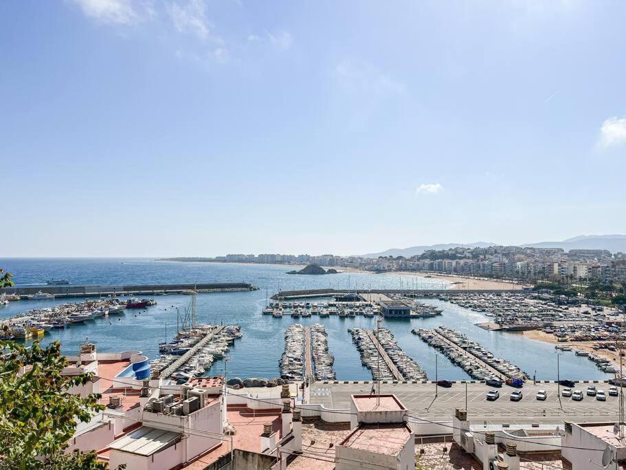 a view of a marina with boats in the water at Apartament 'Es Botànic' in Blanes