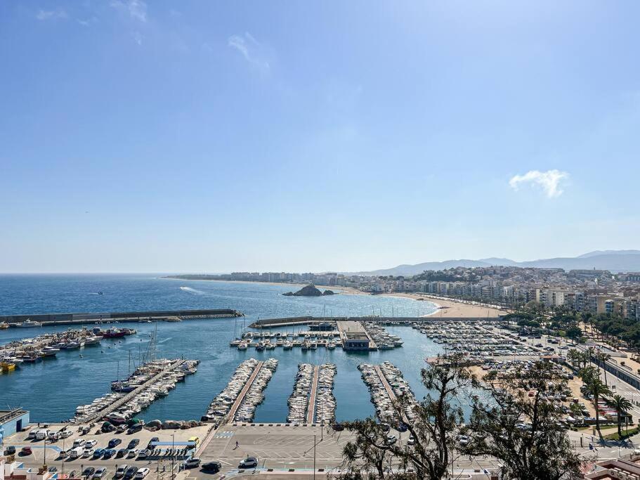 a view of a marina with boats in the water at Apartament 'Es Botànic' in Blanes