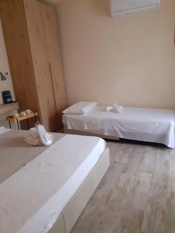 Postel nebo postele na pokoji v ubytování BIANCA LAMIA Ostuni