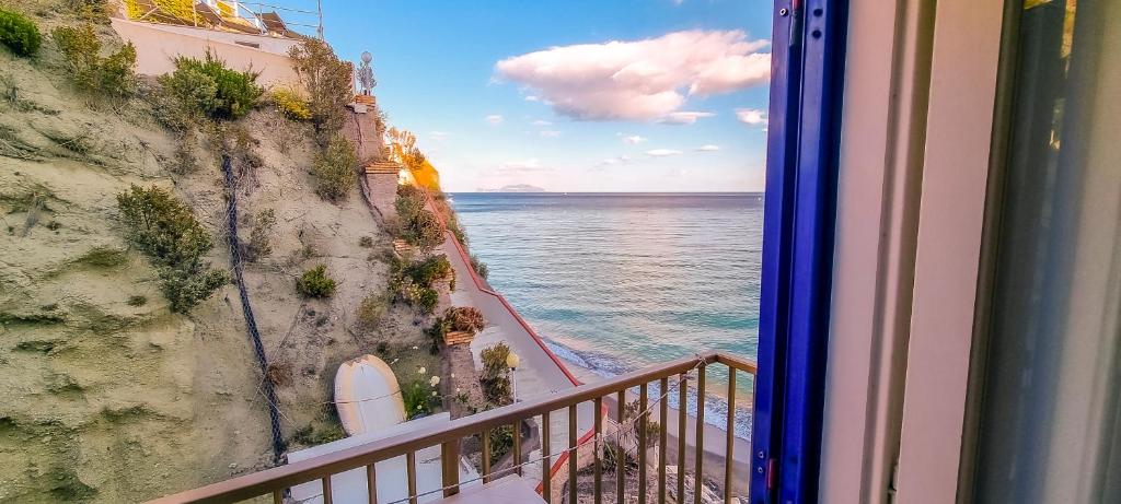 a view of the ocean from a balcony at Hotel Regina del Mare in Ischia