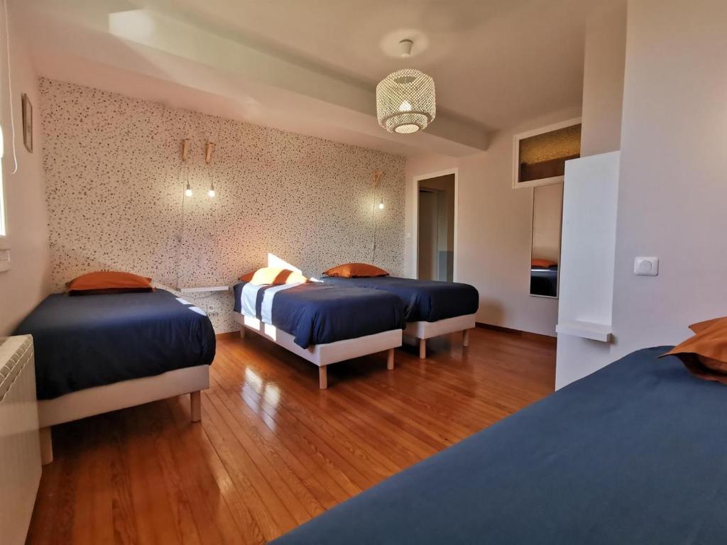 Postel nebo postele na pokoji v ubytování Chambres d'hôtes - Le Moussat