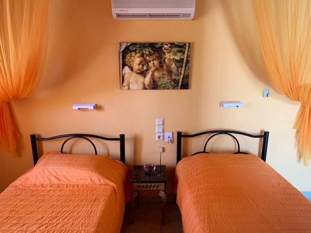 Postel nebo postele na pokoji v ubytování Palma Sidari Corfu
