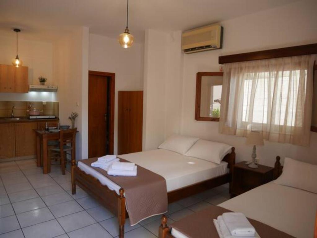 Chrysoula’s Welcoming Triple Room with Yard - One-Bedroom Apartment