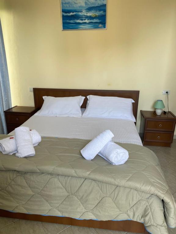 Postel nebo postele na pokoji v ubytování Sanremo Hotel Restorant