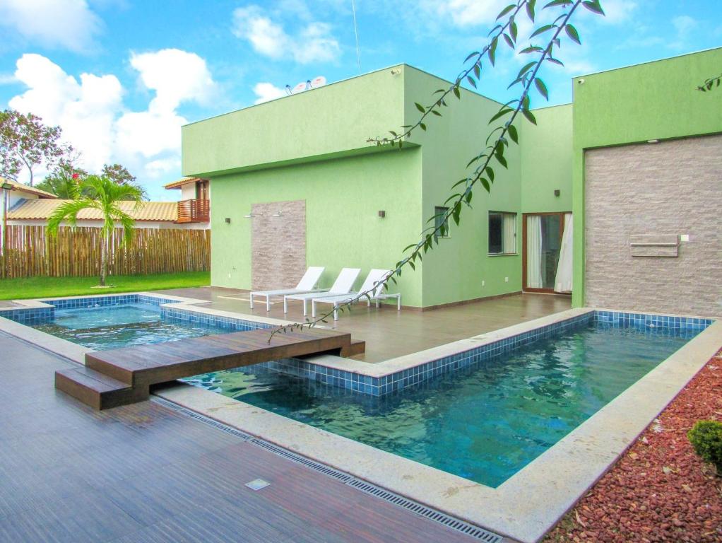Bazén v ubytování Casa c otima infraestrutura e piscina, Camacari BA nebo v jeho okolí