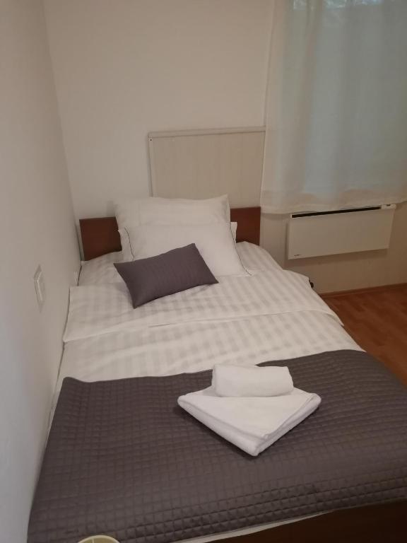 Postel nebo postele na pokoji v ubytování Apartmaji Z Fizine