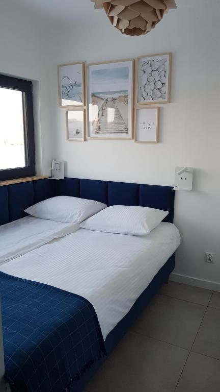 Postel nebo postele na pokoji v ubytování Żurawi Las