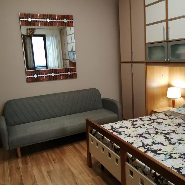 Uma cama ou camas num quarto em Ivana home