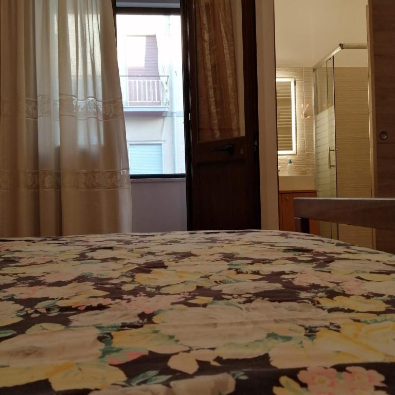 Uma cama ou camas num quarto em Ivana home