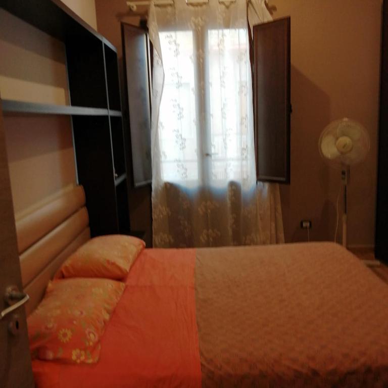 Uma cama ou camas num quarto em Ivana home