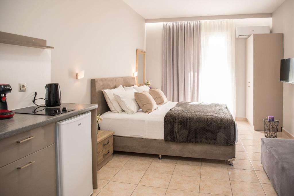 Postel nebo postele na pokoji v ubytování Avyssos Residents