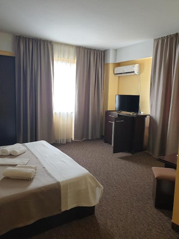 Postel nebo postele na pokoji v ubytování Casa Mario