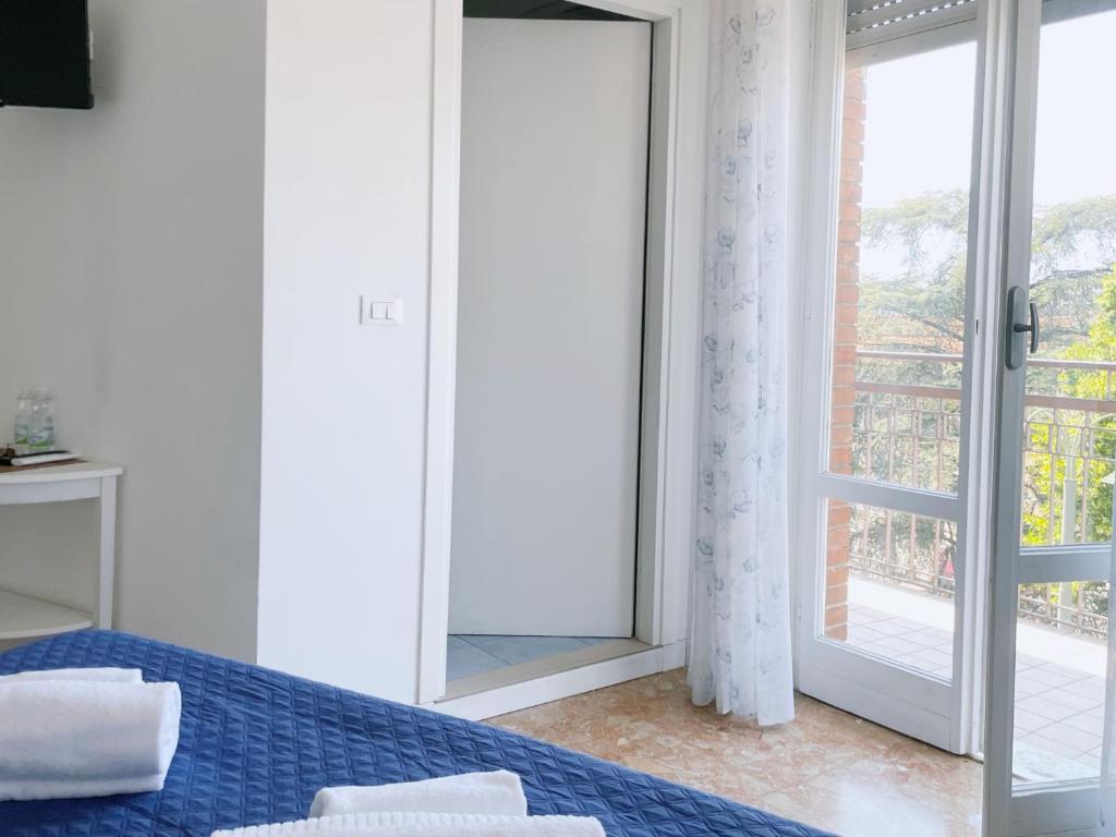 Postel nebo postele na pokoji v ubytování Confortini Rooms SUNDAY
