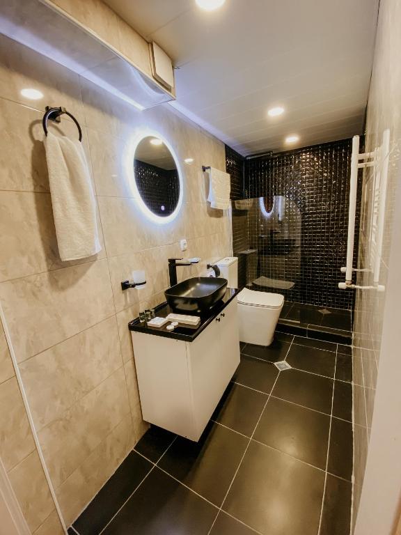 Koupelna v ubytování Luxury Duplex Suites - City Center