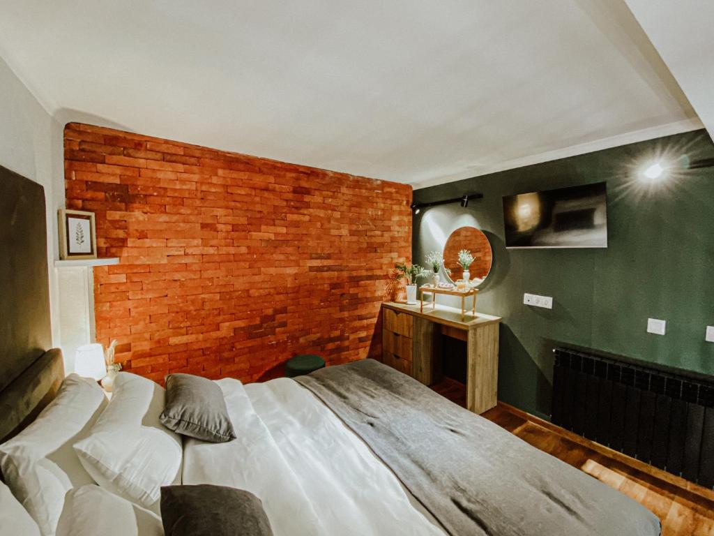 TV a/nebo společenská místnost v ubytování Luxury Duplex Suites - City Center