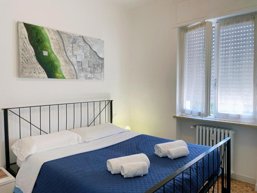 Postel nebo postele na pokoji v ubytování Confortini Rooms SUNDAY