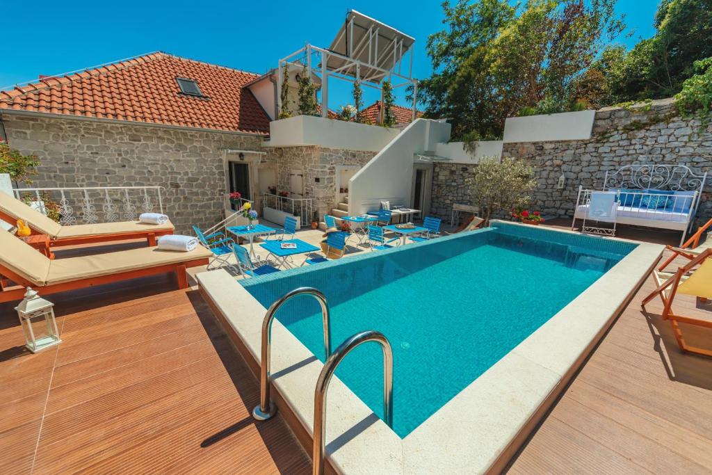 Bazén v ubytování Boutique Hotel Capitano nebo v jeho okolí