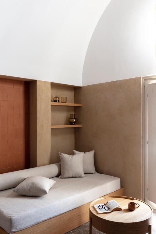 Postel nebo postele na pokoji v ubytování Ethos Vegan Suites