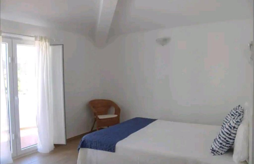 Кровать или кровати в номере Sudoeste Guest House