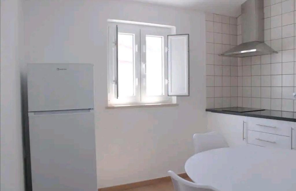 Кровать или кровати в номере Sudoeste Guest House
