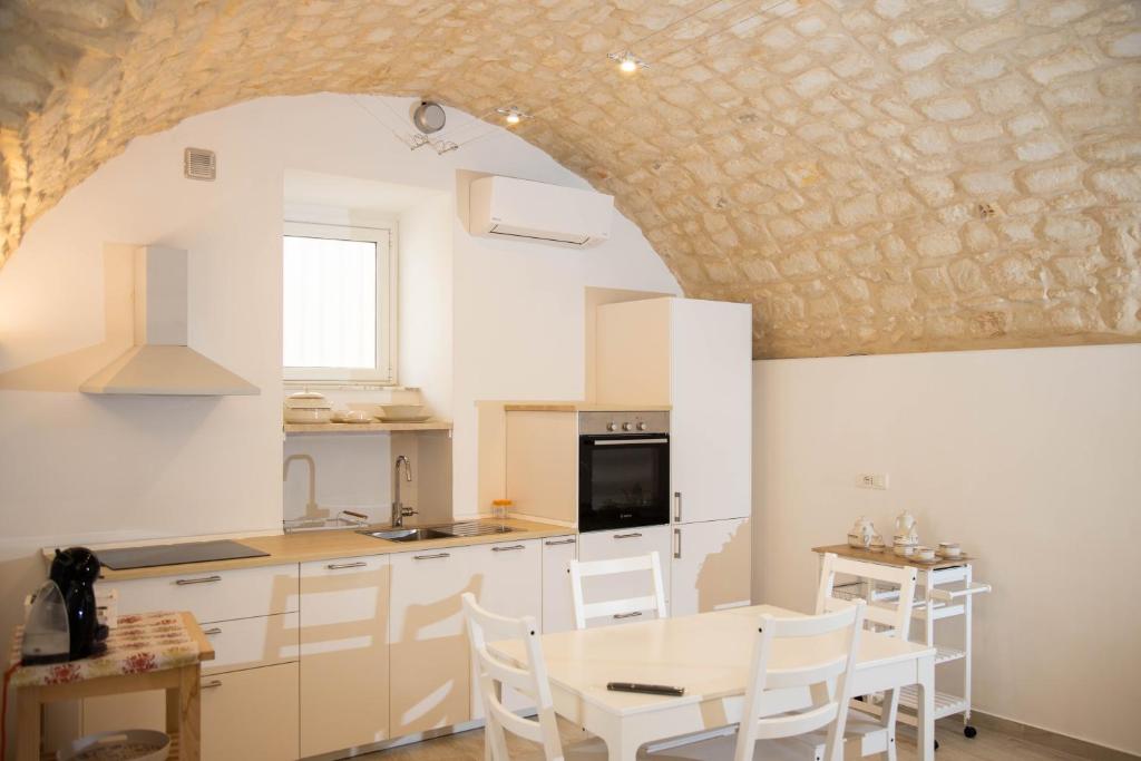 Kuchyňa alebo kuchynka v ubytovaní Casa di Gio