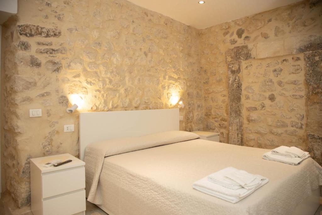 Posteľ alebo postele v izbe v ubytovaní Casa di Gio
