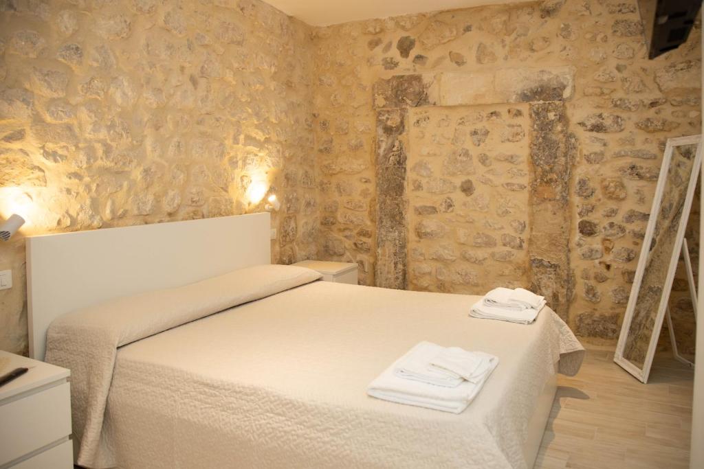 Posteľ alebo postele v izbe v ubytovaní Casa di Gio