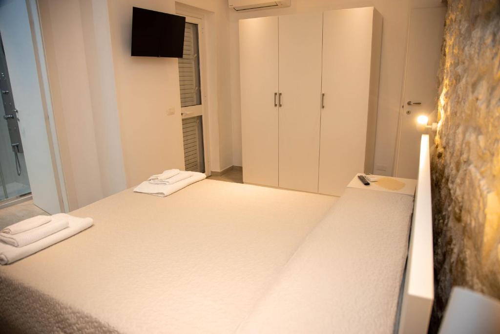 Posteľ alebo postele v izbe v ubytovaní Casa di Gio