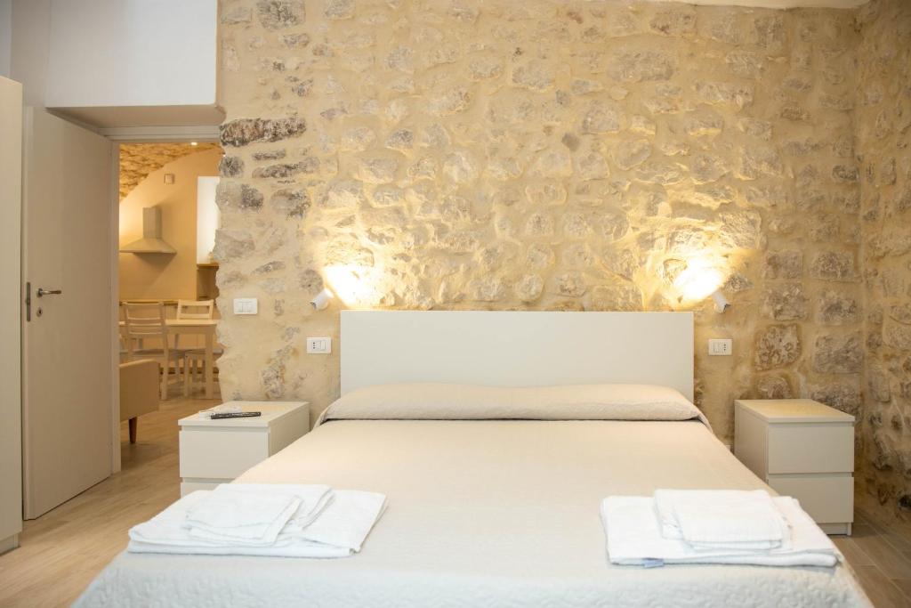 Posteľ alebo postele v izbe v ubytovaní Casa di Gio