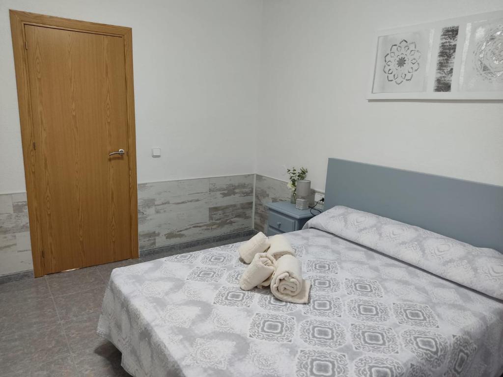 Llit o llits en una habitació de Apartament Cristina