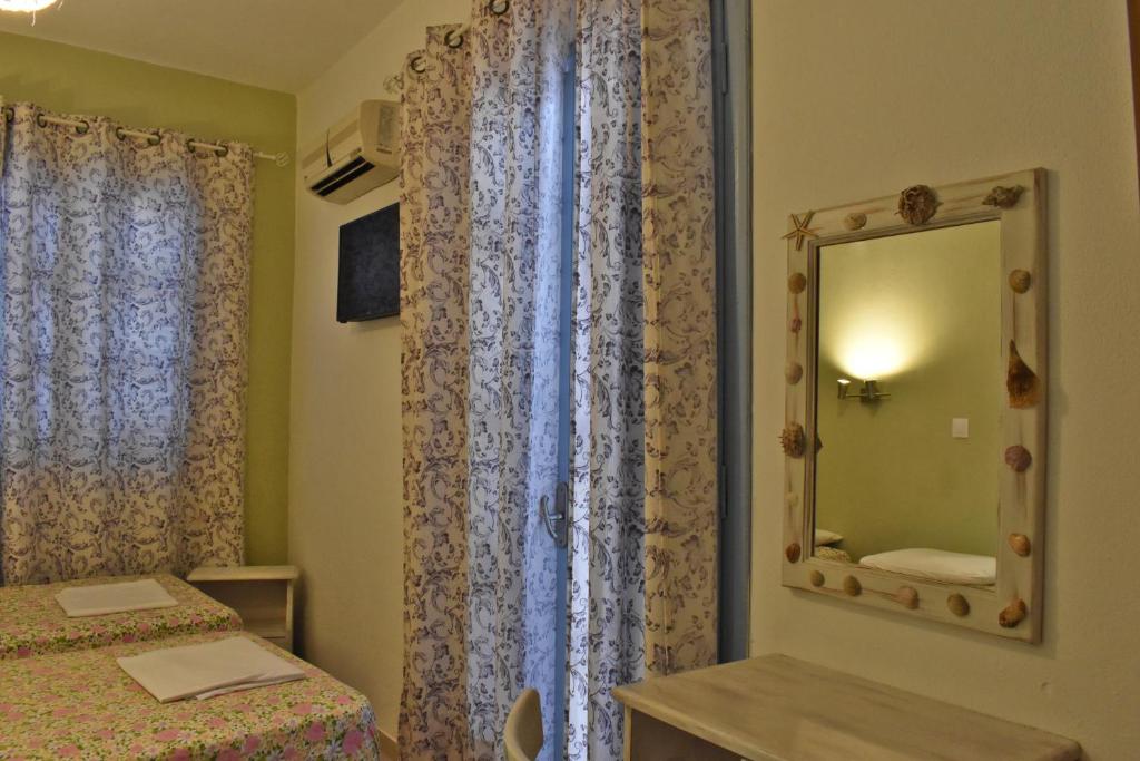 Postel nebo postele na pokoji v ubytování Voula's House