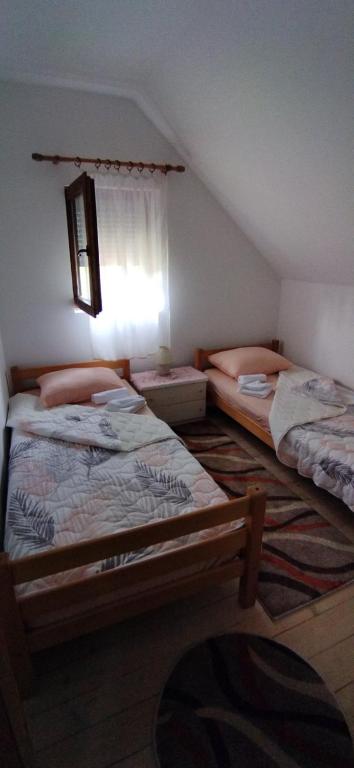 Postel nebo postele na pokoji v ubytování Vikendica Borje