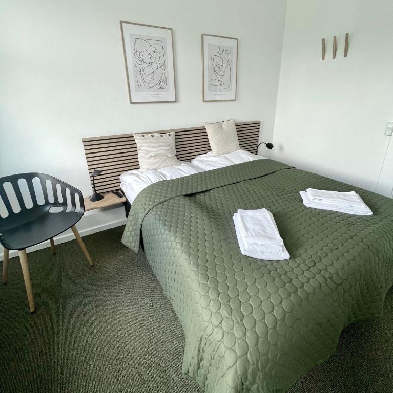 Postel nebo postele na pokoji v ubytování Hos Martin-Kontaktløs & selv check-In
