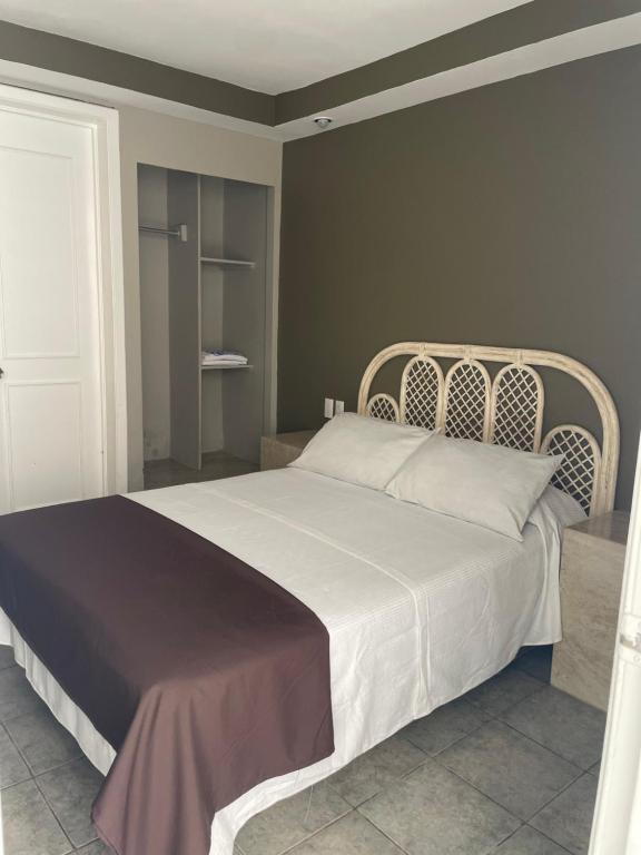 Postel nebo postele na pokoji v ubytování Hotel Rias