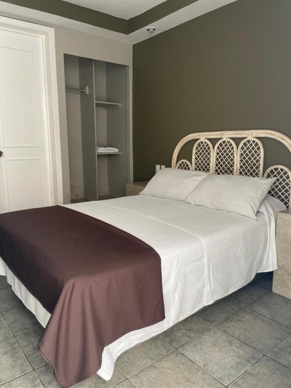 Postel nebo postele na pokoji v ubytování Hotel Rias