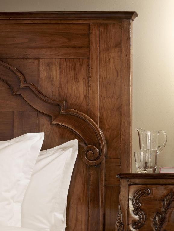 Postel nebo postele na pokoji v ubytování Guarda Golf Hotel & Residences