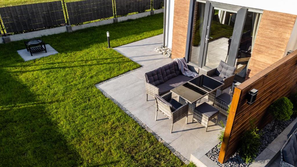 Vonkajšia záhrada v ubytovaní CHILL HAUS APARTAMENTY , Domki