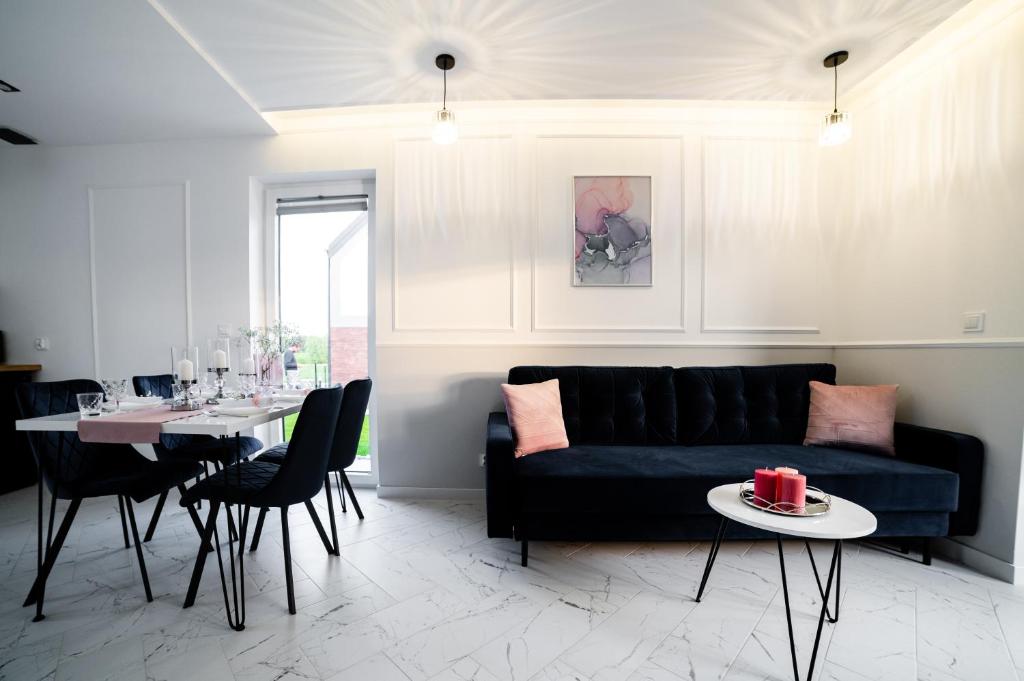 Posedenie v ubytovaní CHILL HAUS APARTAMENTY , Domki