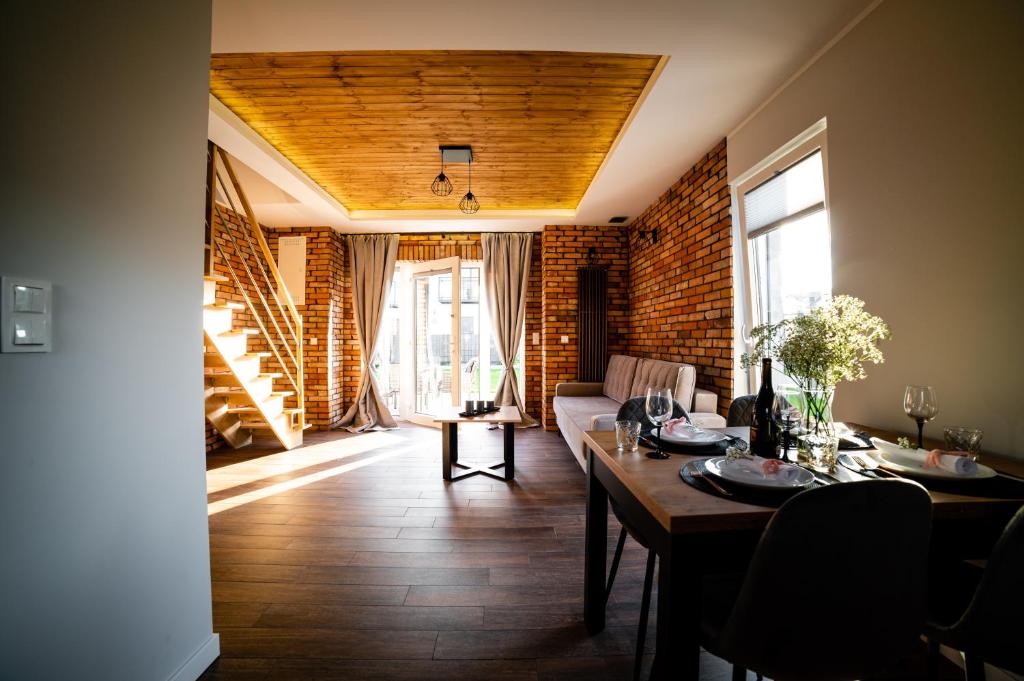 Posedenie v ubytovaní CHILL HAUS APARTAMENTY , Domki