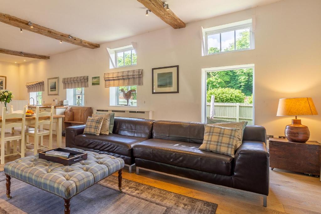 Zona d'estar a Stylish luxury cottage in historic country estate - Belchamp Hall Coach House