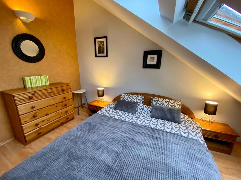 Posteľ alebo postele v izbe v ubytovaní Dekoratoria Apartments
