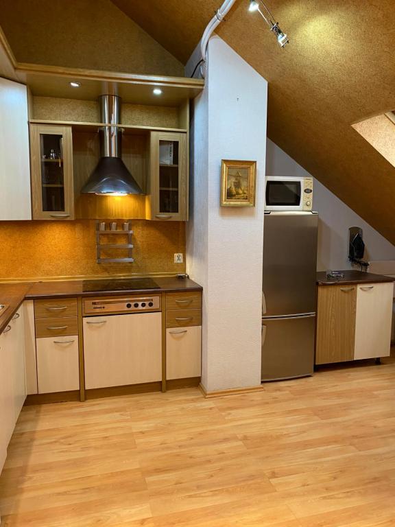 Kuchyňa alebo kuchynka v ubytovaní Dekoratoria Apartments