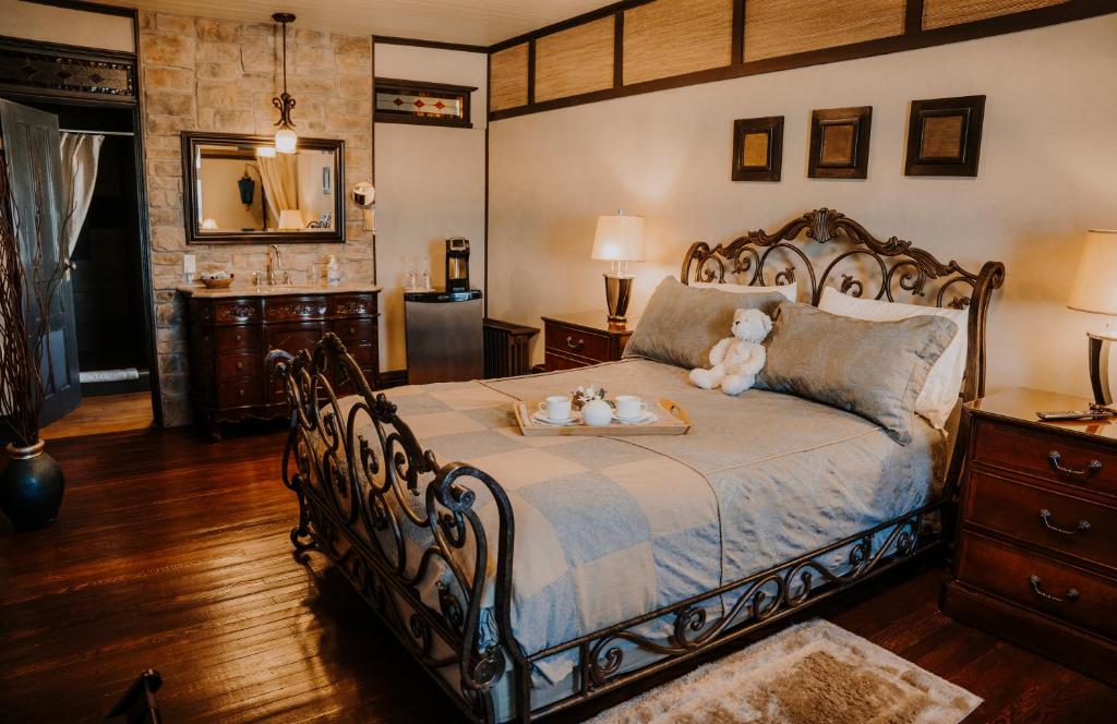 A bed or beds in a room at Auberge Bruine Océane