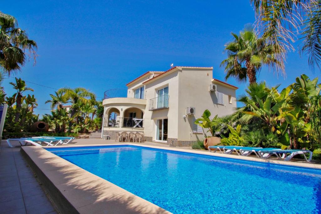 The swimming pool at or close to Estrella - holiday home with stunning views and private pool in Benissa