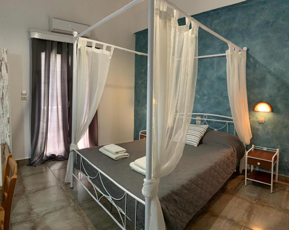 Postel nebo postele na pokoji v ubytování Villa Ilios