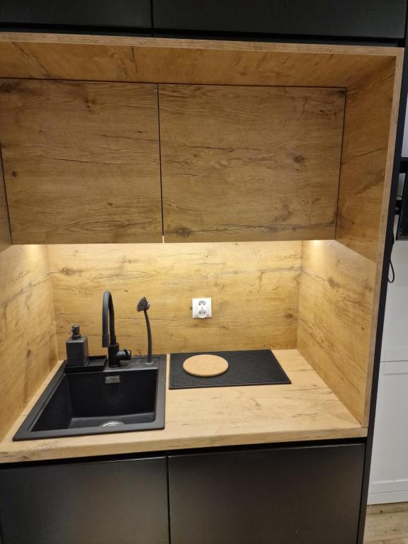Kuchyňa alebo kuchynka v ubytovaní Klimatyczny Apartament na Bydgoskim Przedmieściu