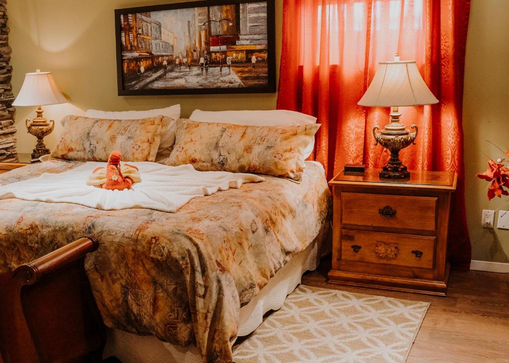A bed or beds in a room at Auberge Bruine Océane