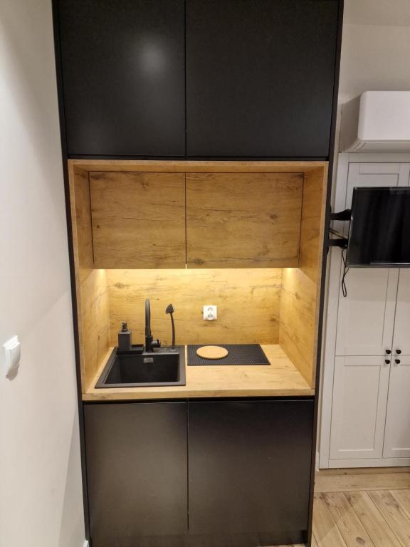 Kuchyňa alebo kuchynka v ubytovaní Klimatyczny Apartament na Bydgoskim Przedmieściu