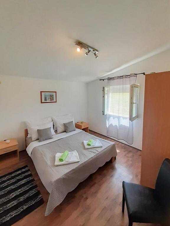 Postel nebo postele na pokoji v ubytování Sunshine Apartment